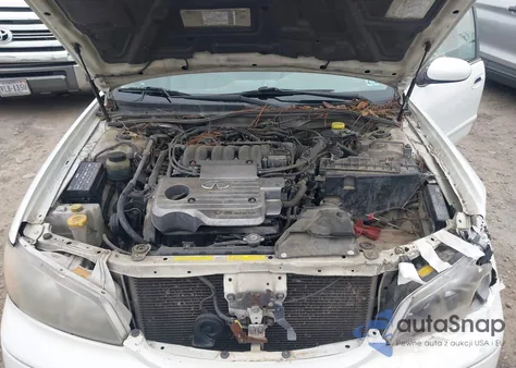 2001 Infiniti I30 Touring z USA, uszkodzony, nr VIN JNKCA31AX1T022847